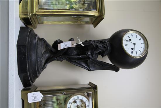 T. Lemaire. A cast iron mantel clock, 21in.
